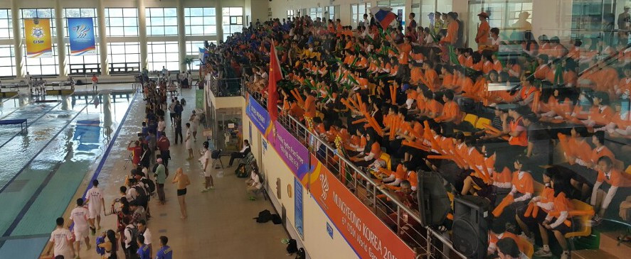 Orange clad South Korean fans cheering on their team on a successful day for the host nation ©CISM World Games