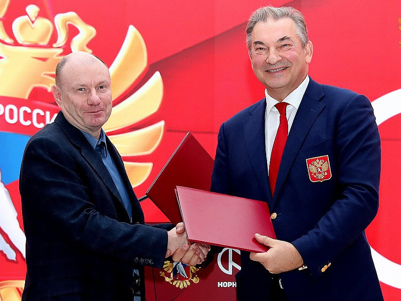 Vladimir Potanin, chairman of the Board of Norilsk Nickel. pictured, left, with Vladislav Tretiak, President of the Russian Ice Hockey Federation, at the announcement of a four-year sponsorship deal leading up to Beijing 2022 ©RHF