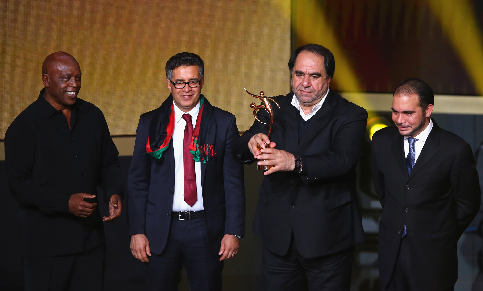 Keramuudin Karim, second right, has already been suspended from his position as Afghanistan Football Federation President after allegations of sexual abuse emerged ©Getty Images