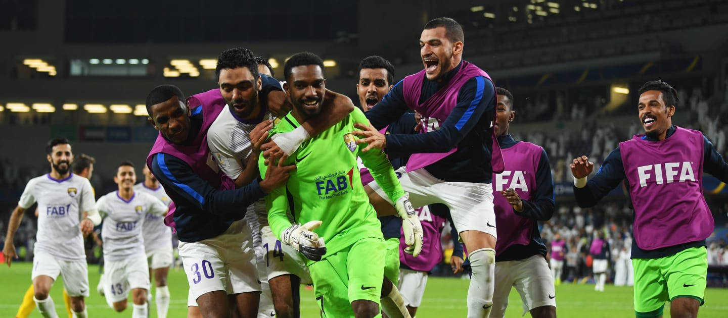 Home side Al Ain's keeper Khalid Esa, named man of the match, is mobbed by fellow players after his save earned his team a 4-3 win on penalties over Team Wellington to reach the quarter-finals of the FIFA Club World Cup in the UAE ©FIFA 