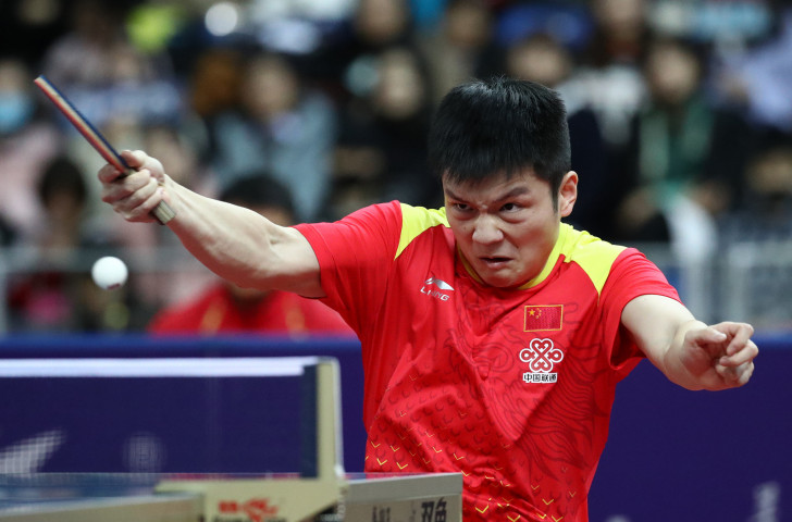 China's defending champion Fan Zhendong en route to victory in his opening men's singles match at the ITTF World Tour Grand Finals in Incheon ©Getty Images  