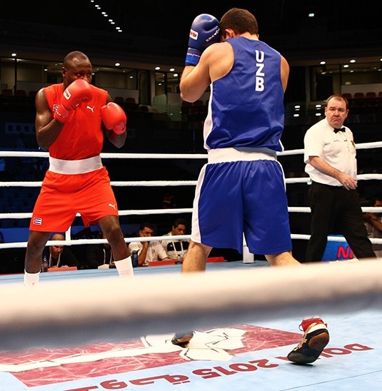 Cuban heavyweight Erislandy Savon (red) got the better of Uzbekistan's Rustam Tulaganov (blue) ©Hill+Knowlton Strategies