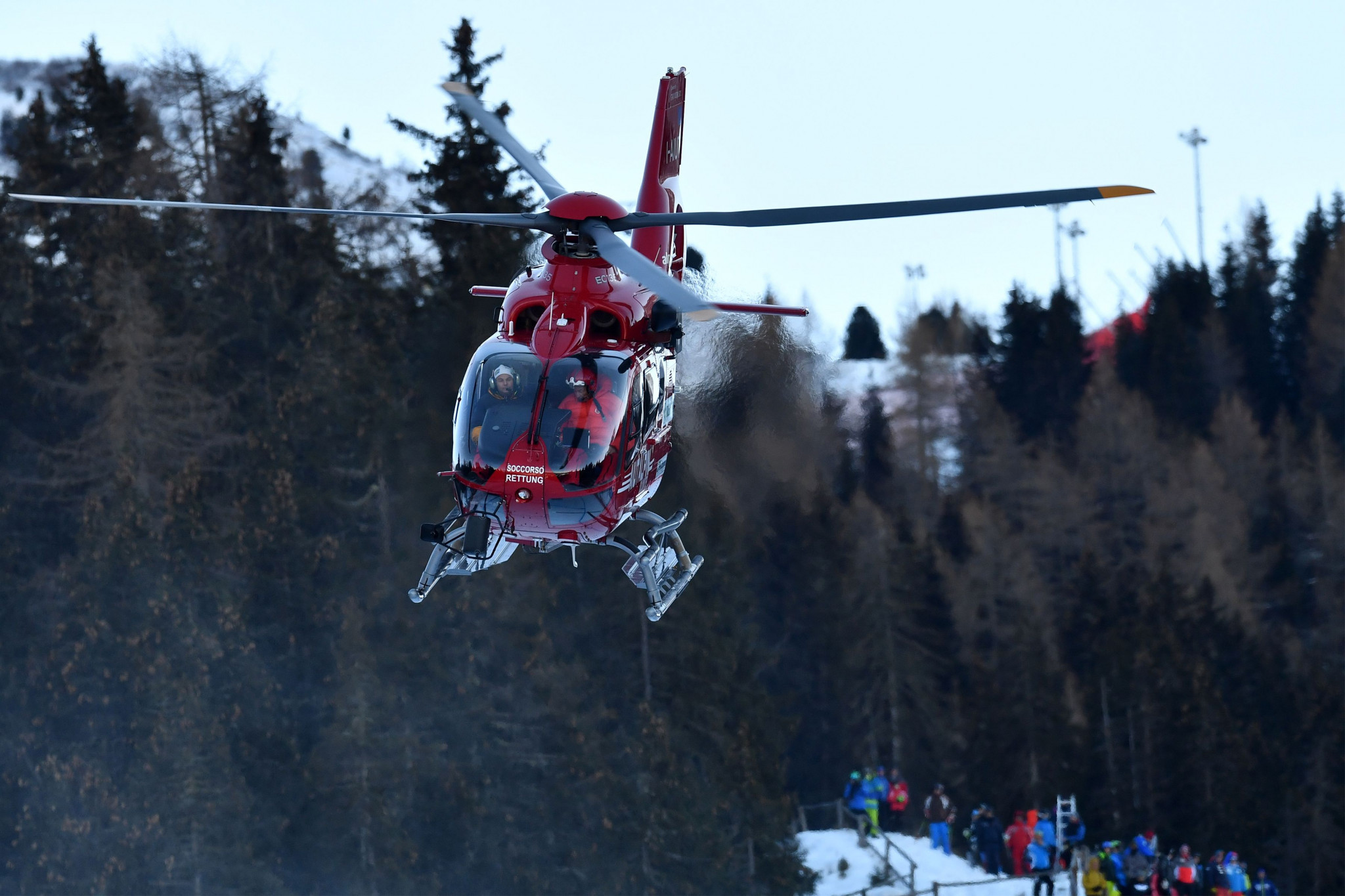 A helicopter airlifts Marc Gisin from the course after his serious crash ©Getty Images