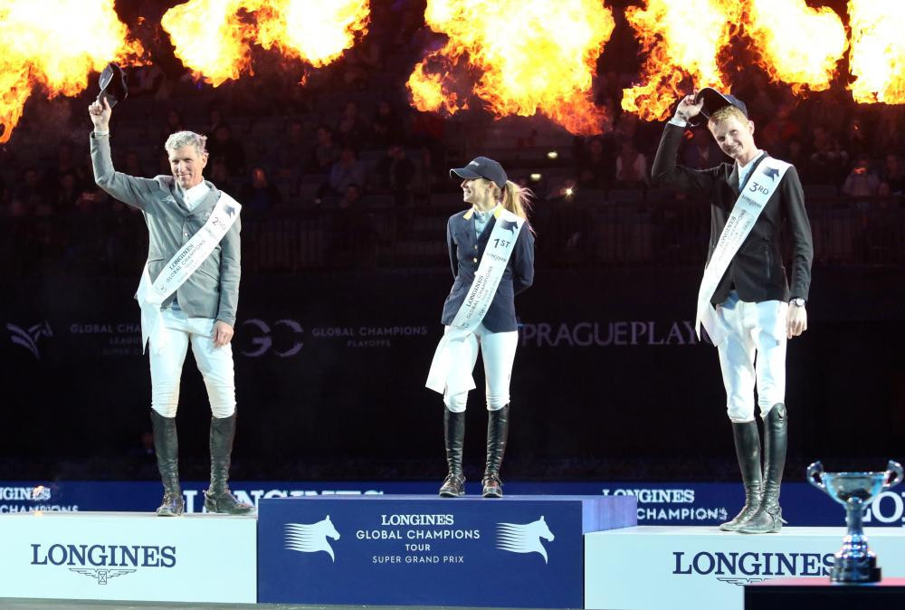Australia's Edwina Tops-Alexander, metaphorically top of the podium, flanked by Germany's Ludger Beerbaum, left, and The Netherlands' Frank Schuttert at the Prague Playoffs in the 02 Arena ©GCL