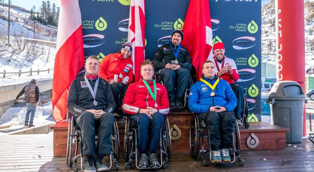 Canada's Lonnie Bissonnette, centre, celebrated a win double at the IBSF Para Bobsleigh World Cup in Park City ©IBSF
