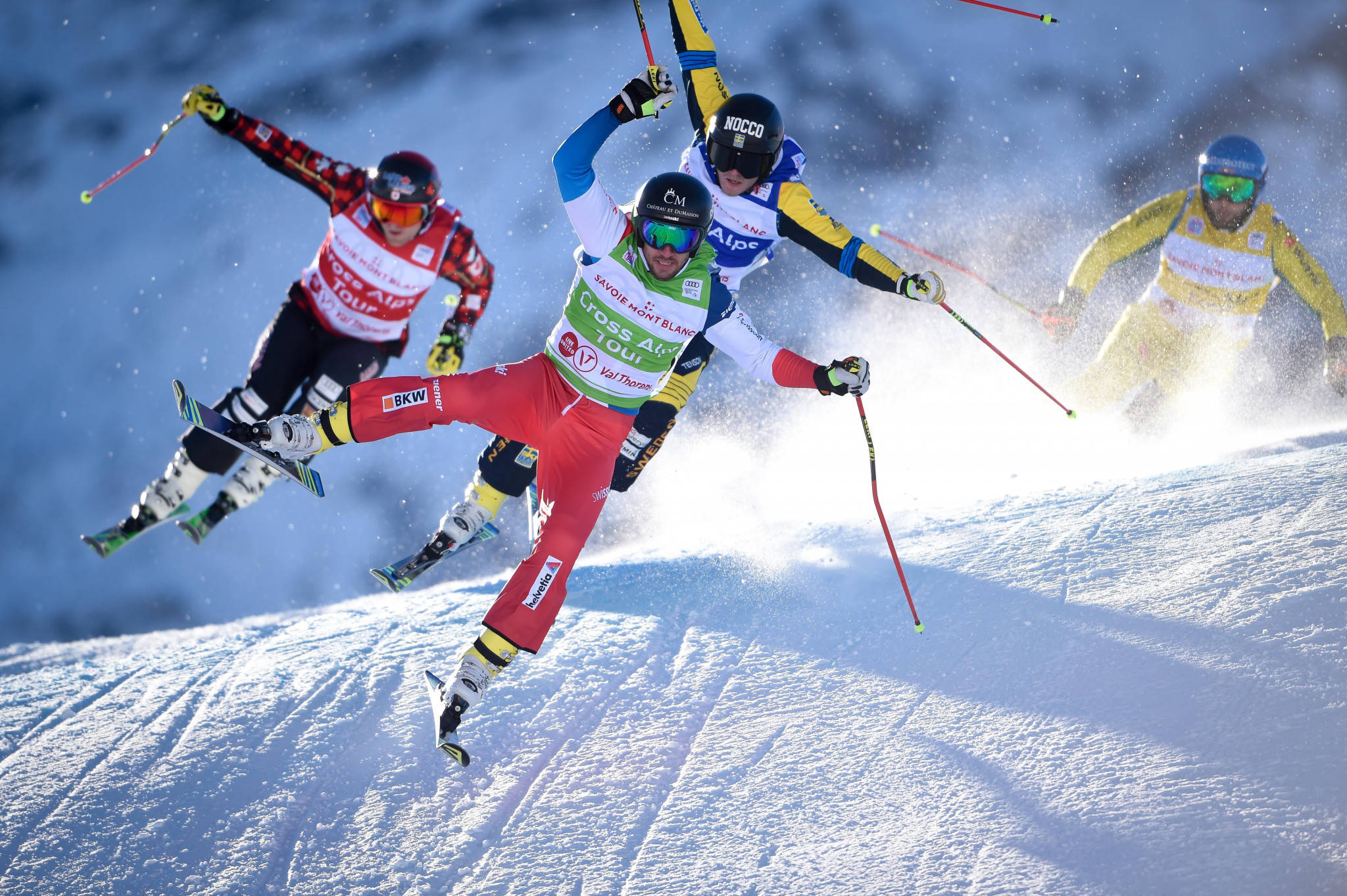 Joos Berry, centre, claimed gold today on the second day of Ski Cross World Cup racing in Innichen ©Getty Images