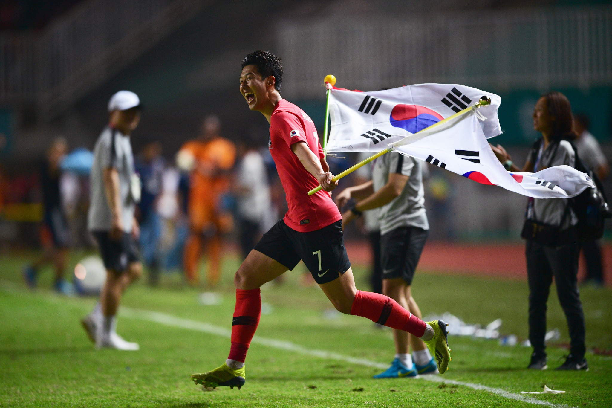 South Korea's forward Son Heung-min celebrates after defeating Japan during the men's football gold medal match ©Getty Images