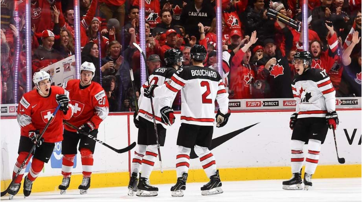 Canada beat Switzerland in their second game of the IIHF World Junior Championships to consolidate their lead in Group A ©IIHF/ Matt Zambonin