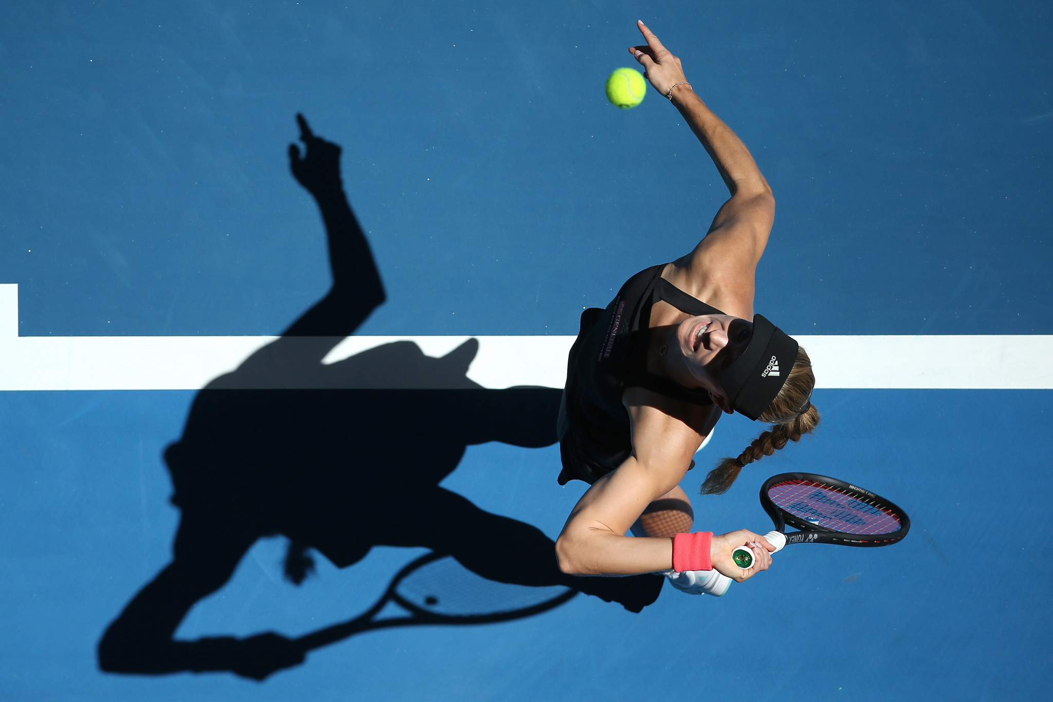 Germany's Angelique Kerber serves the ball in her victory against Garbine Muguruza in Germany and Spain's clash at the Hopman Cup in Perth ©Getty Image