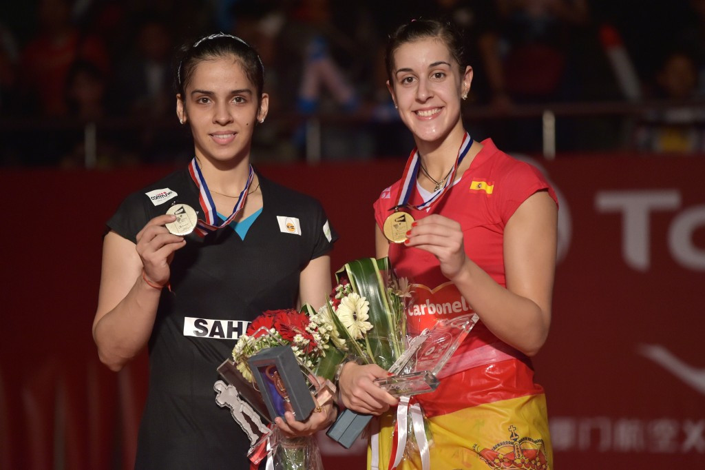 Saina Nehwal (left) pictured with world champion Carolina Marin following their final in Jakarta ©AFP/Getty Images