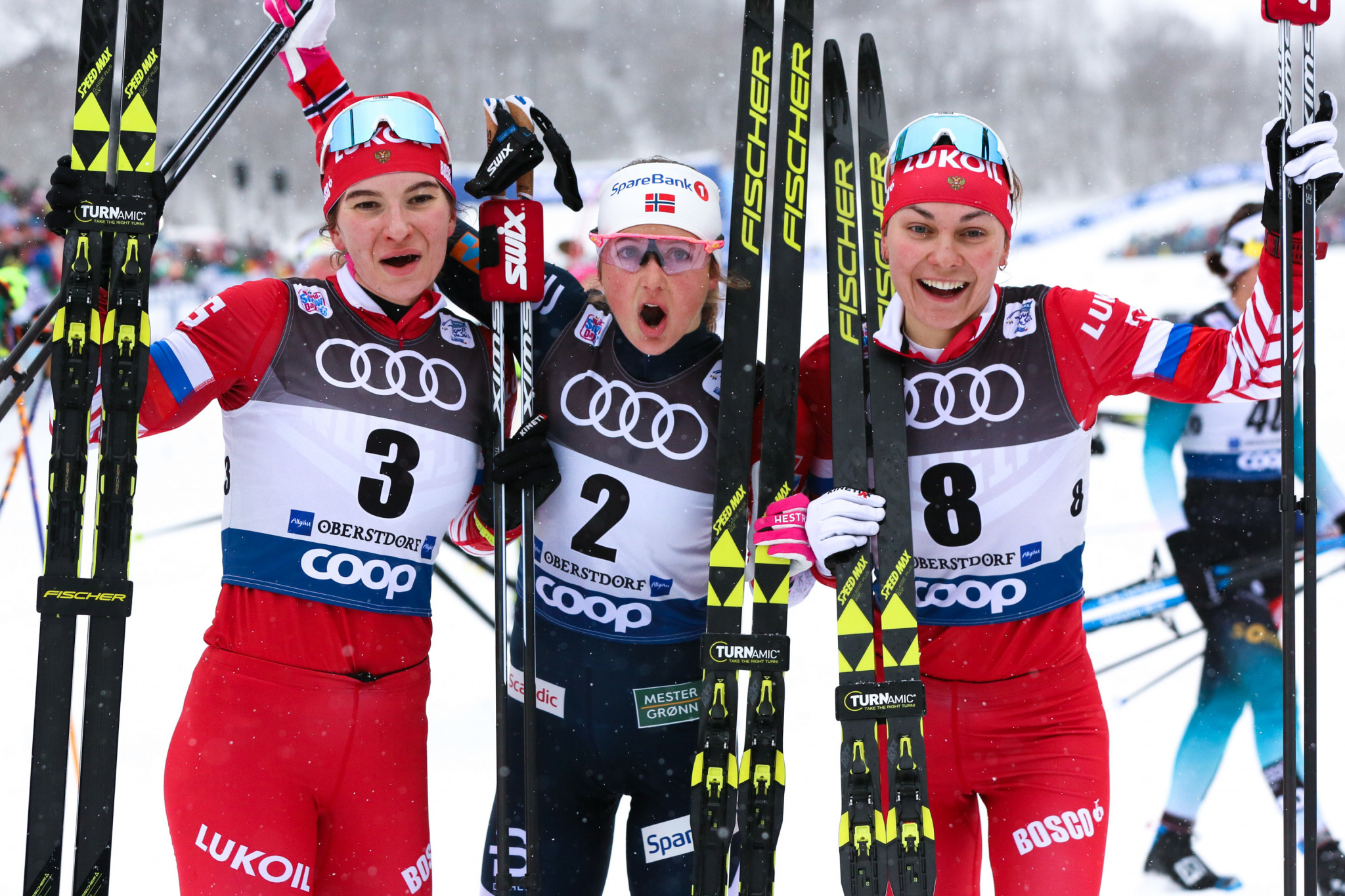 Ingvild Flugstad Østberg, centre, won the women's race in Oberstdorf to take the overall Tour de Ski lead ©Getty Images