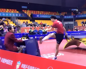 Chinese table tennis player Fang Bo has apologised for kicking a towel-rack in anger during a match ©YouTube
