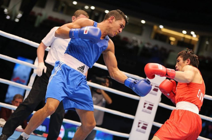 Yeleussinov's opponent will be number two seed Mohammed Rabii (blue) of Morocco, who beat China's Wei Liu (red) ©AIBA/Facebook 