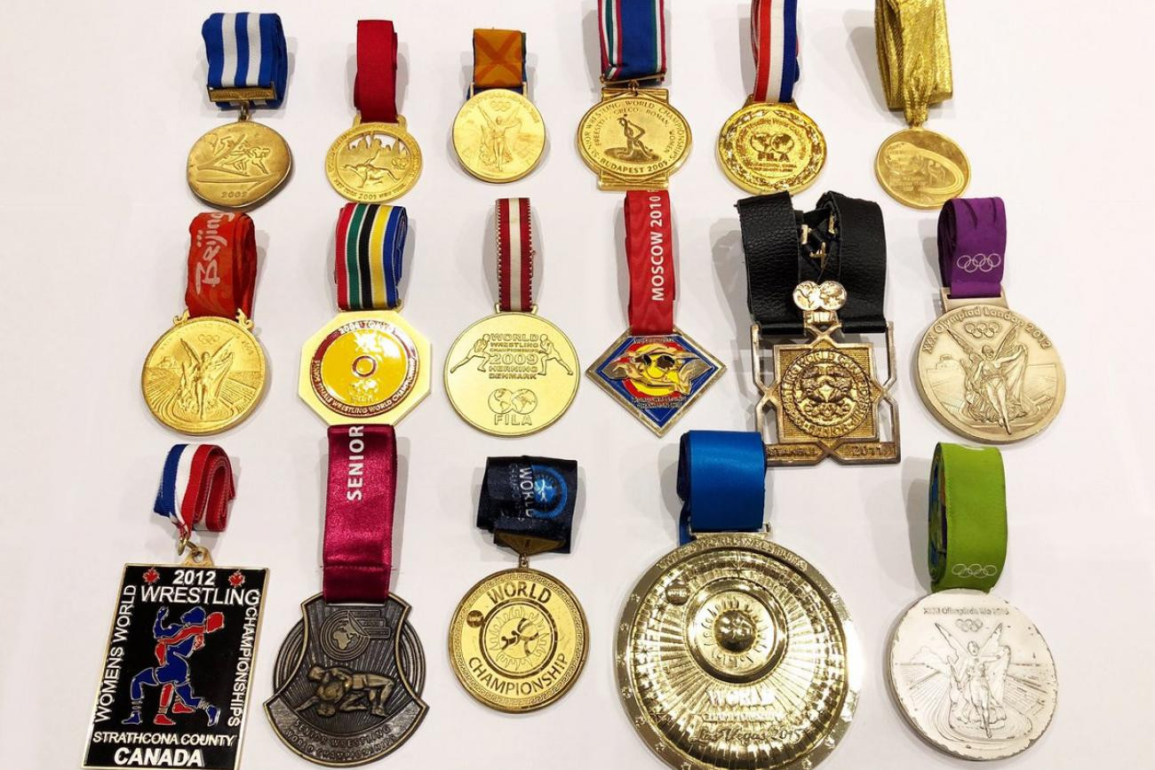 Saori Yoshida's medal collection includes three Olympic golds, 13 world golds and four golds from the Asian Games ©UWW