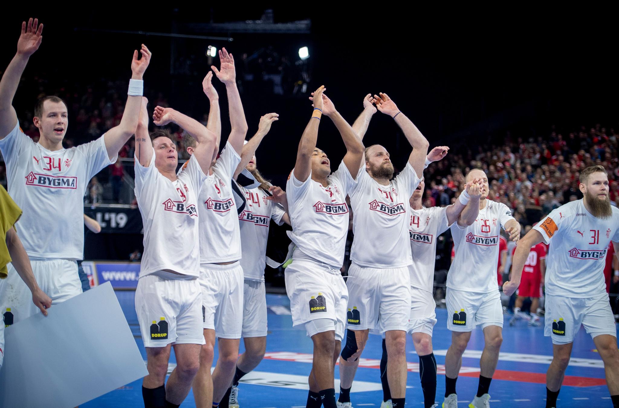 Denmark celebrate after beating Chile in their first game of the IHF Men's Handball World Championship ©Getty Images