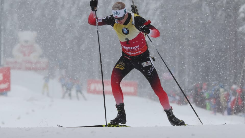 Norway's Johannes Thingnes Bø won the men's race during a heavy snowfall ©IBU