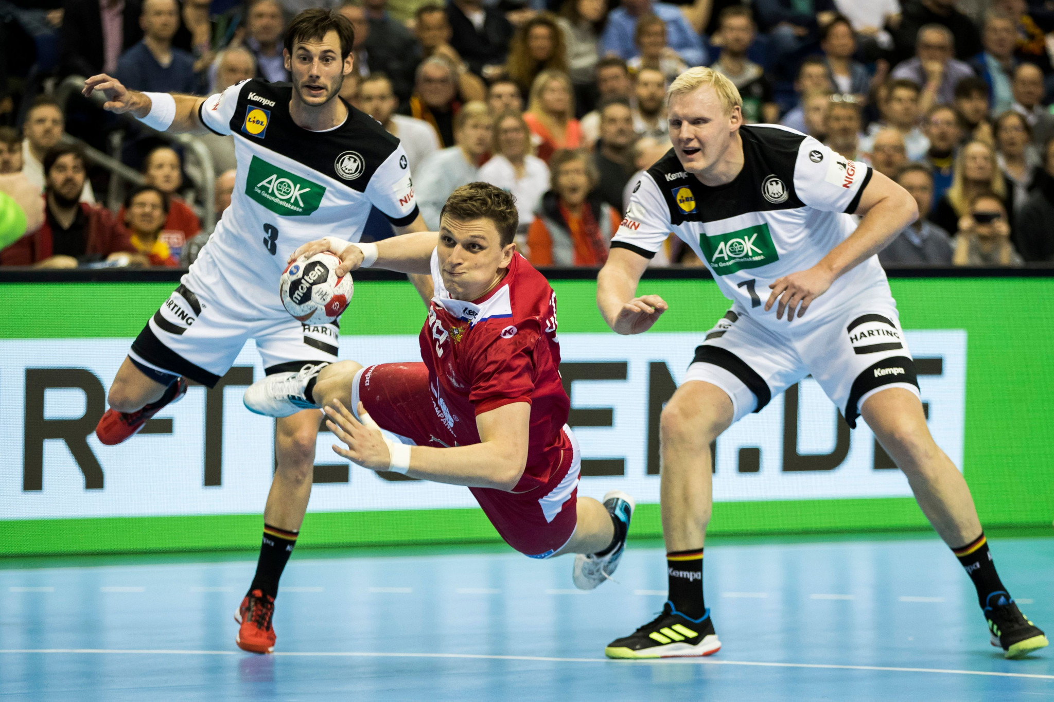Co-hosts Germany denied third straight win at IHF Men's Handball World Championship as Russia snatch late draw