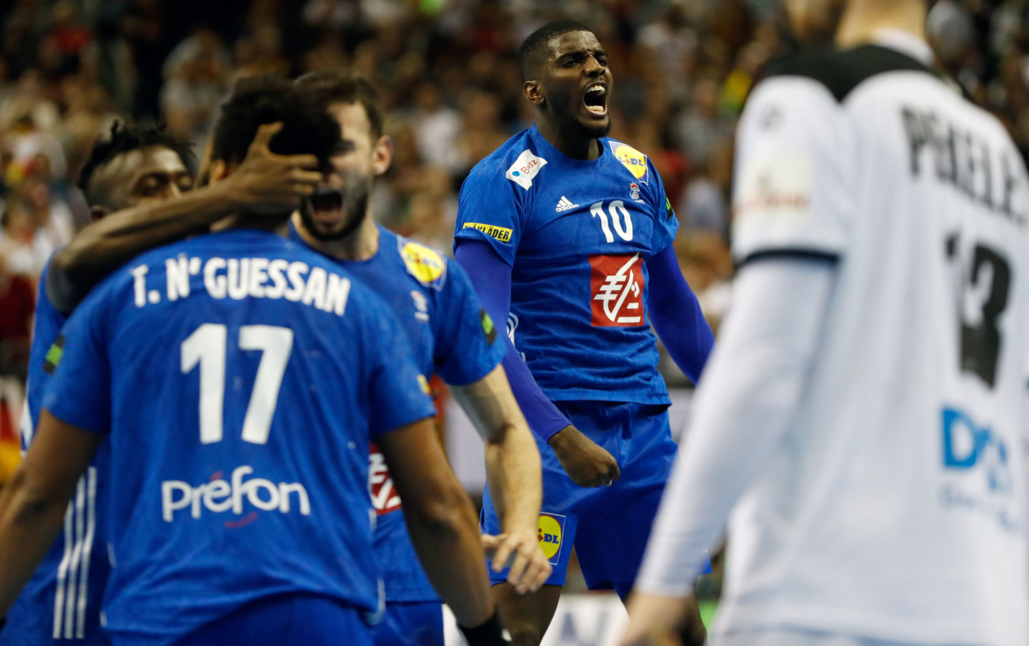 Defending champions strike late to preserve unbeaten record and hand Germany second draw at IHF Men's Handball World Championship