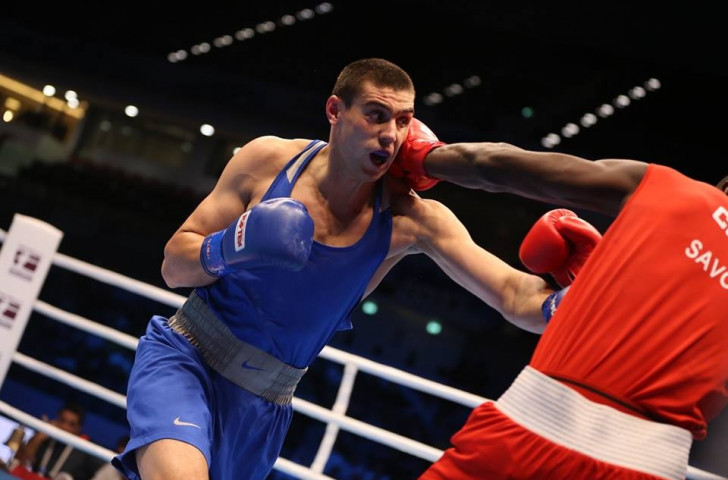 Evgeny Tishchenko doubled Russia's gold medal tally by overcoming Cuba's Erislandy Savon in the heavyweight showdown ©AIBA/Facebook 