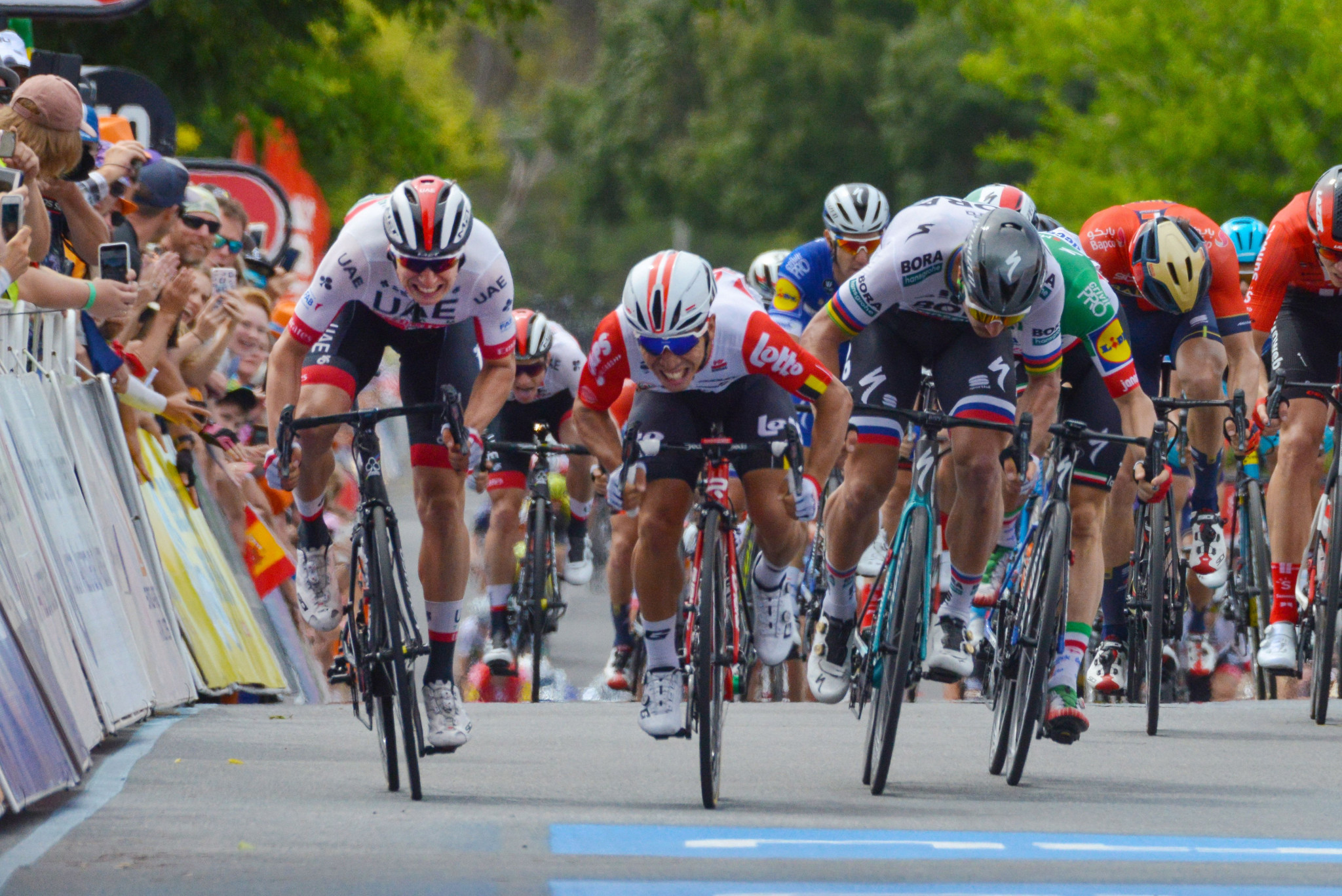 Caleb Ewan, centre, was dropped to the back of the front group following the alleged infringement ©Getty Images