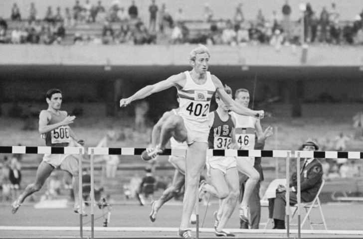 Britain's David Hemery en route to victory in the 1968 Olympic 400m hurdles final in a world record of 48.12sec  ©Getty Images