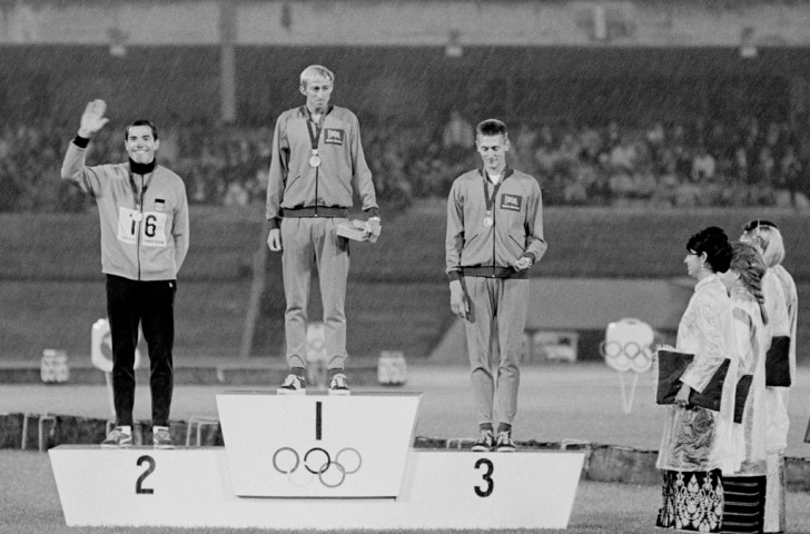 David Hemery on the victory rostrum at the Mexico Games alongside silver medallist  Gerhard Hennige of West Germany and fellow Briton John Sherwood ©Getty Images