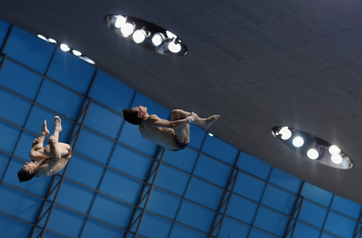 Qin Kai and Yuan Cao took the men’s 3m synchronised springboard crown