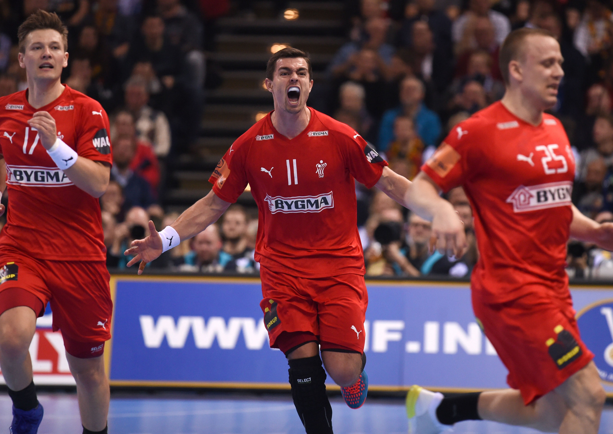 Danish players celebrate beating defending champions France in the semi-final of the IHF Men's Handball World Championship ©Getty Images