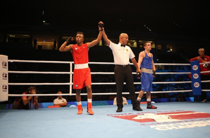Cuba's Lazaro Alvarez claimed his third world crown with a technical knockout win over Azerbaijan's Albert Selimov