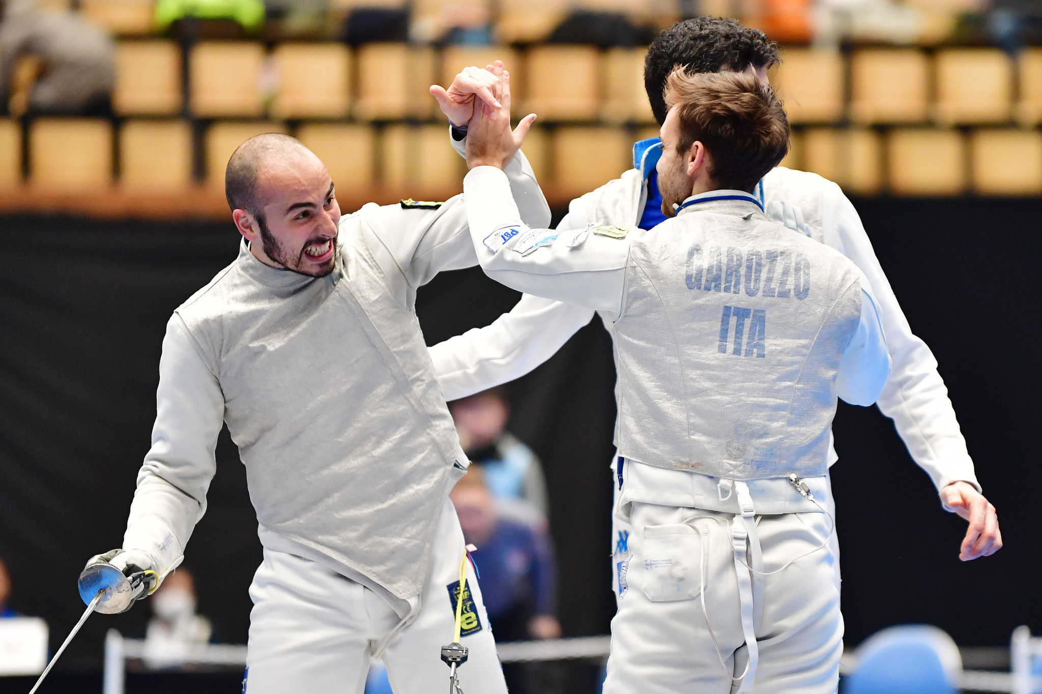 Alessio Foconi, left, helped Italy win the men's team foil title at the FIE Tokyo World Cup ©Getty Images