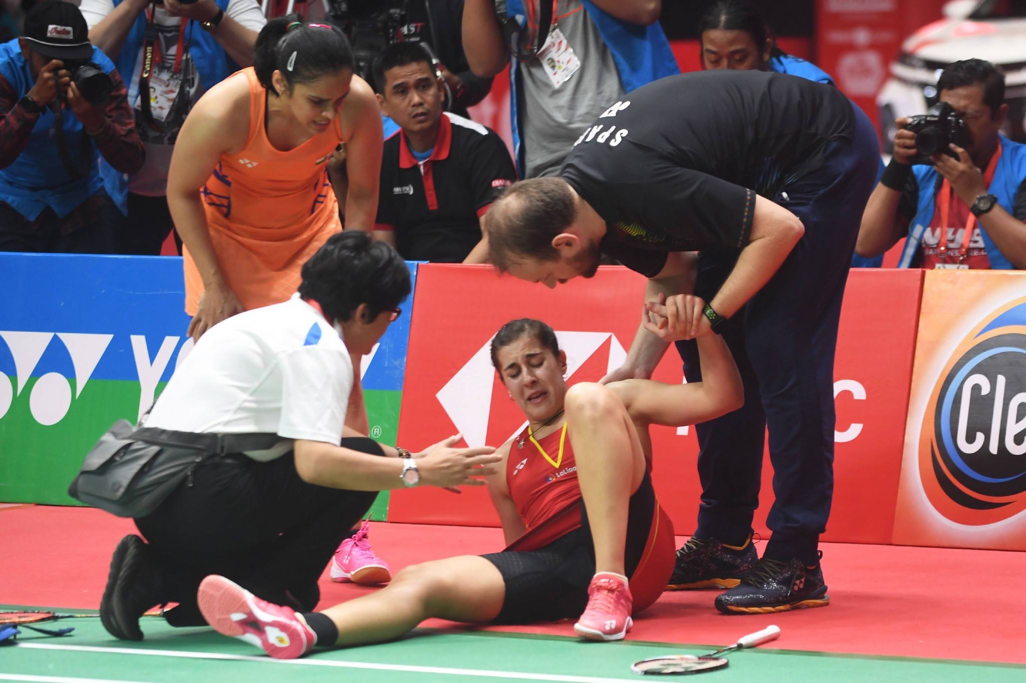 Spaniard Carolina Marin was forced to retire from the women's singles final against Saina Nehwal ©Getty Images
