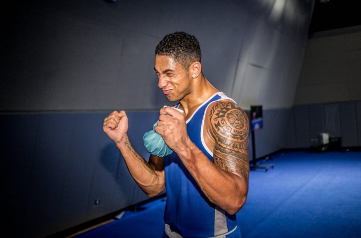 France's Tony Yoka clenches his fists in delight after winning the super heavyweight world title ©AIBA/Facebook