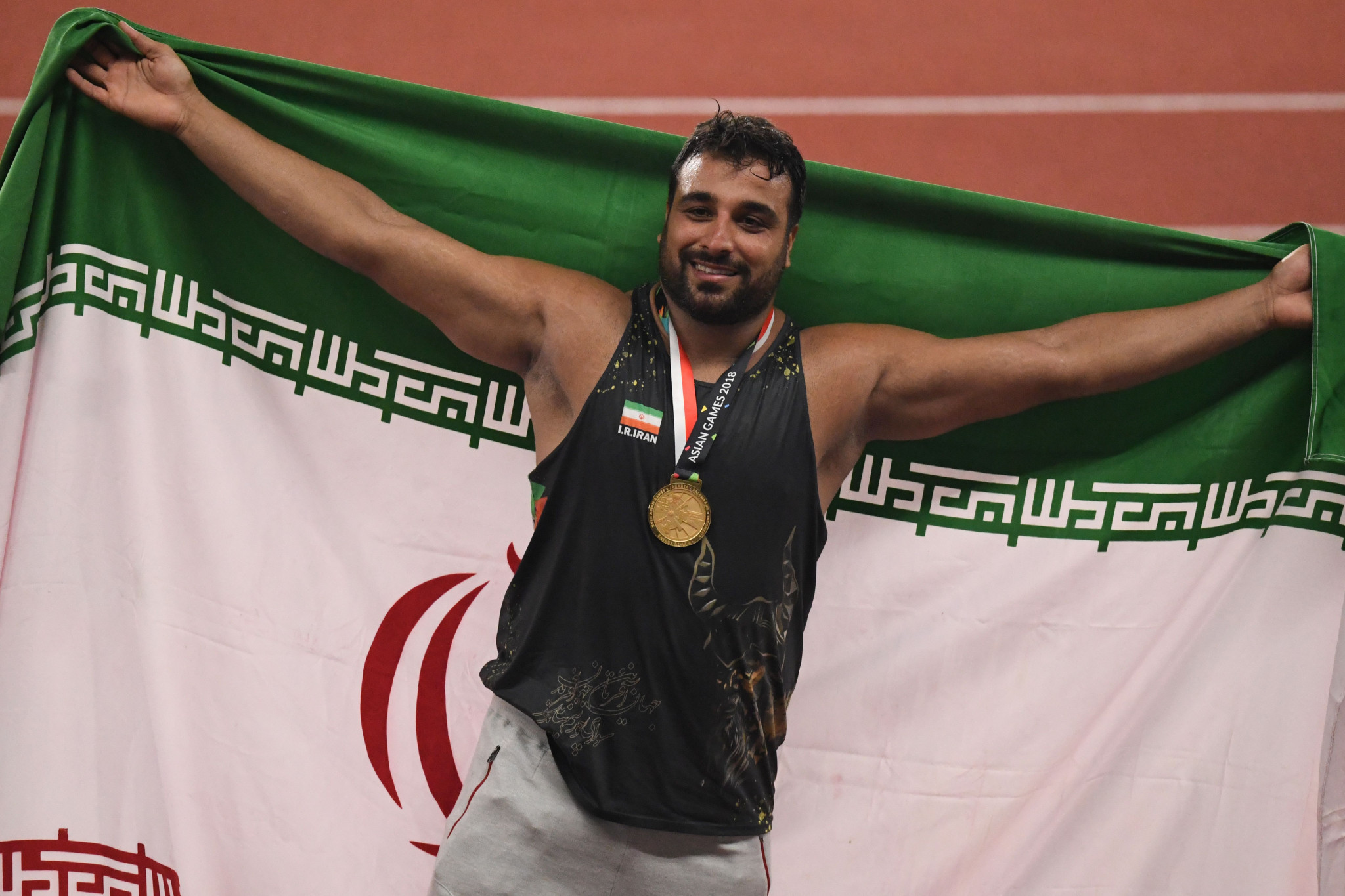 Discus thrower Ehsan Haddadi has also donated memorabilia ©Getty Images 