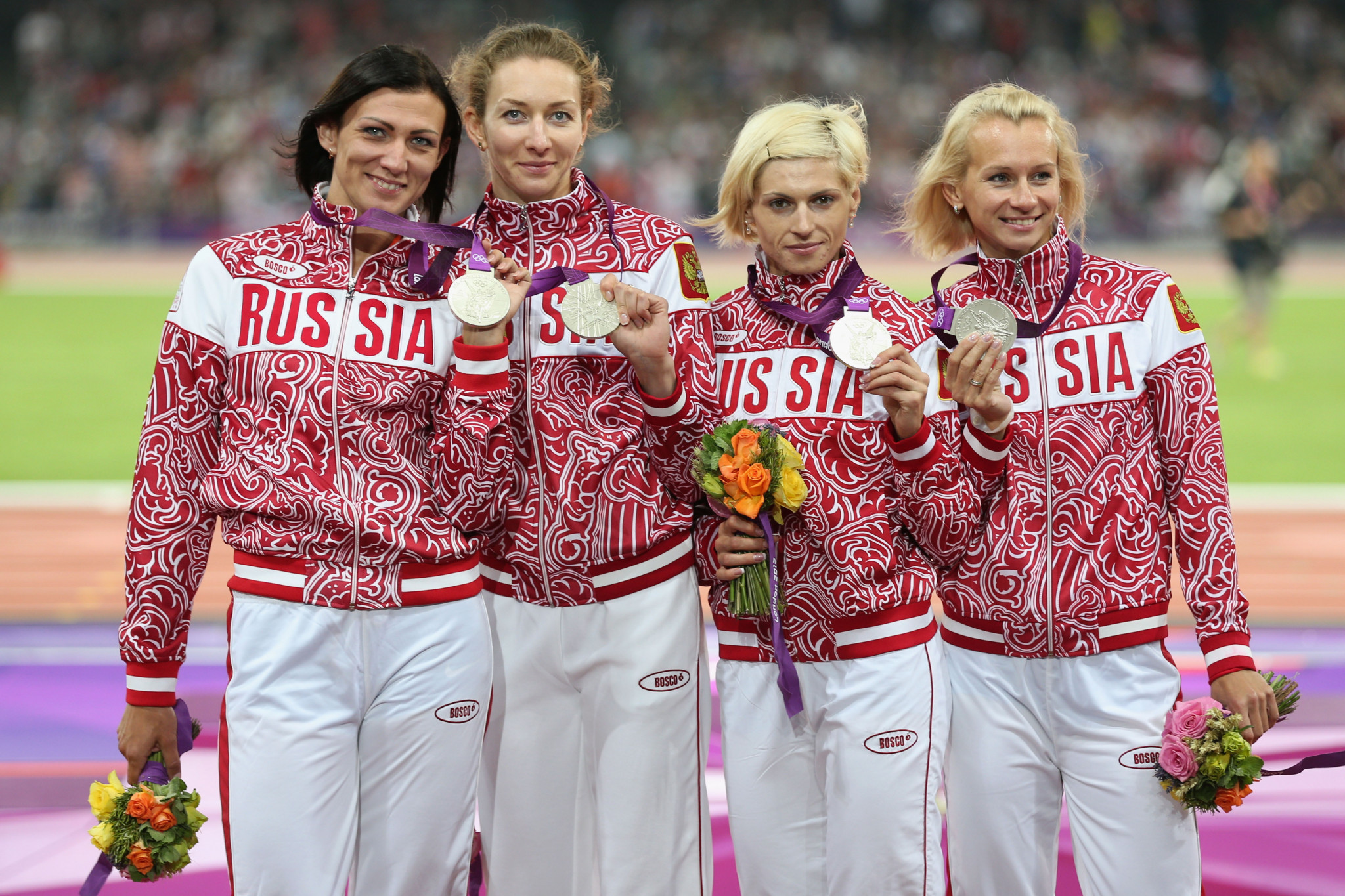 The disqualification by CAS of Tatyana Firova, second right, means three of the four Russian runners who won the Olympic silver medal in the 4x400m at London 2012 have now been disqualified for doping ©Getty Images