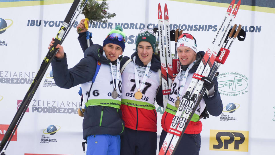 Vebjoern Soerum, centre, won the junior men's sprint at the IBU Youth/Junior World Championships in Osrblie today in a race he described as "perfect" ©IBU