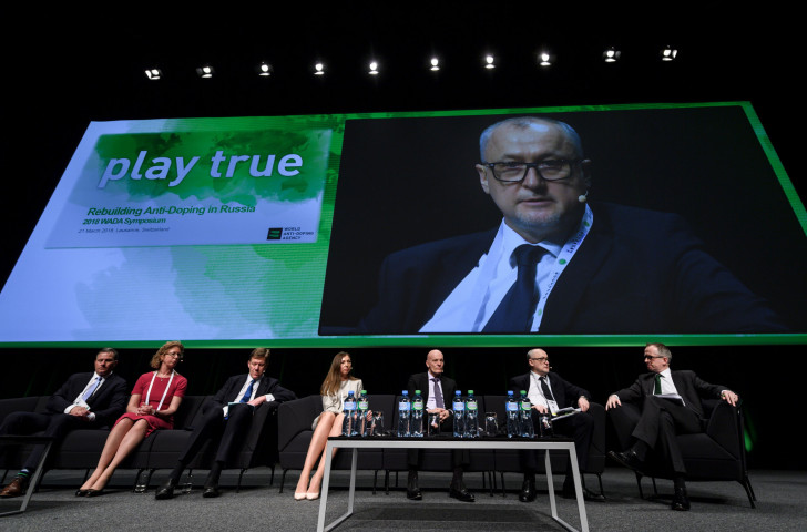 Russian Anti-Doping Dgency director general Yury Ganus is seen on a giant screen during last year's World Anti-Doping Agency Annual Symposium - Gian-Franco Kasper has backed WADA after they reinstated RUSADA ©Getty Images  