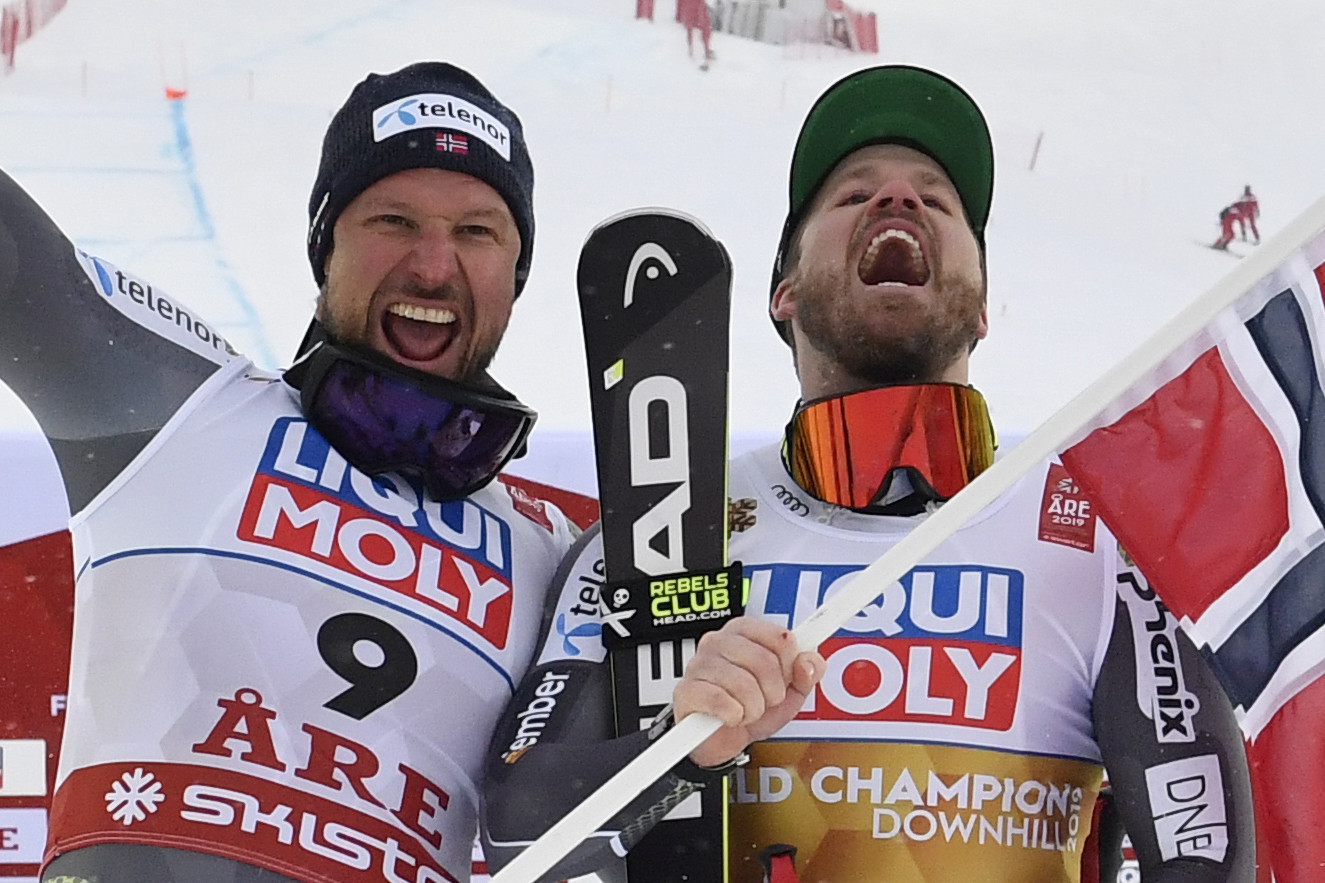 Norway's Aksel Lund Svindal, left, celebrated the end of his career with the silver medal ©Getty Images