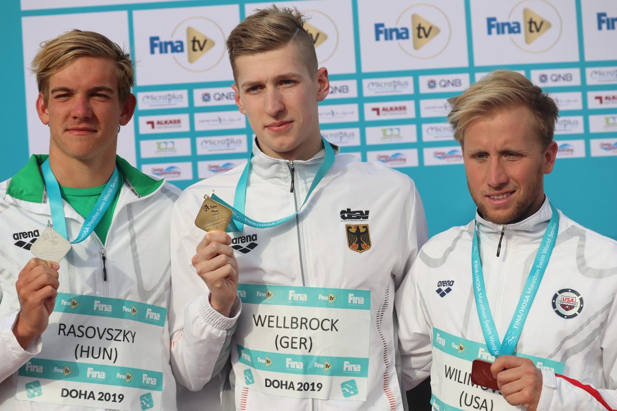 Florian Wellbrock of Germany won the men's first leg of the FINA Marathon Swim World Series in Doha, with Kristof Rasovsky of Hungary in second and  Jordan Wilimovsky of the United States in third ©FINA