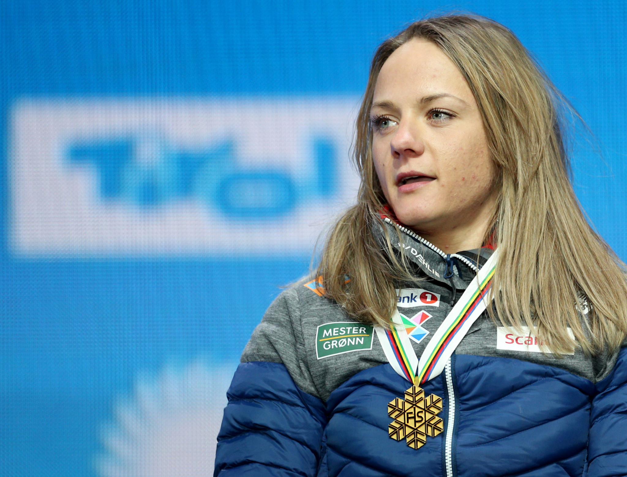 His compatriot Maiken Caspersen Falla received her medal for winning the women's event ©Getty Images