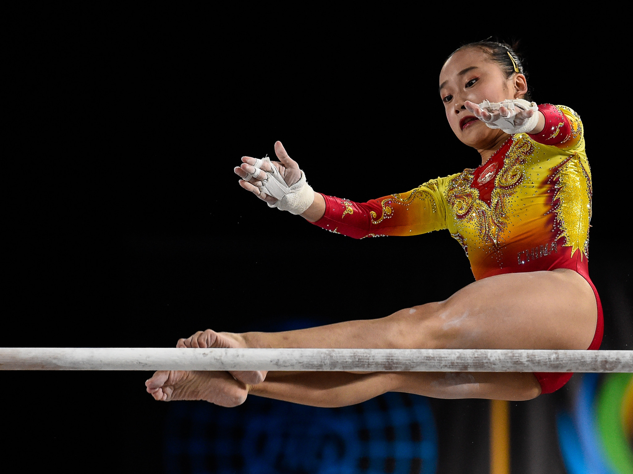 Fan triumphs with assured uneven bars performance at FIG Individual Apparatus World Cup