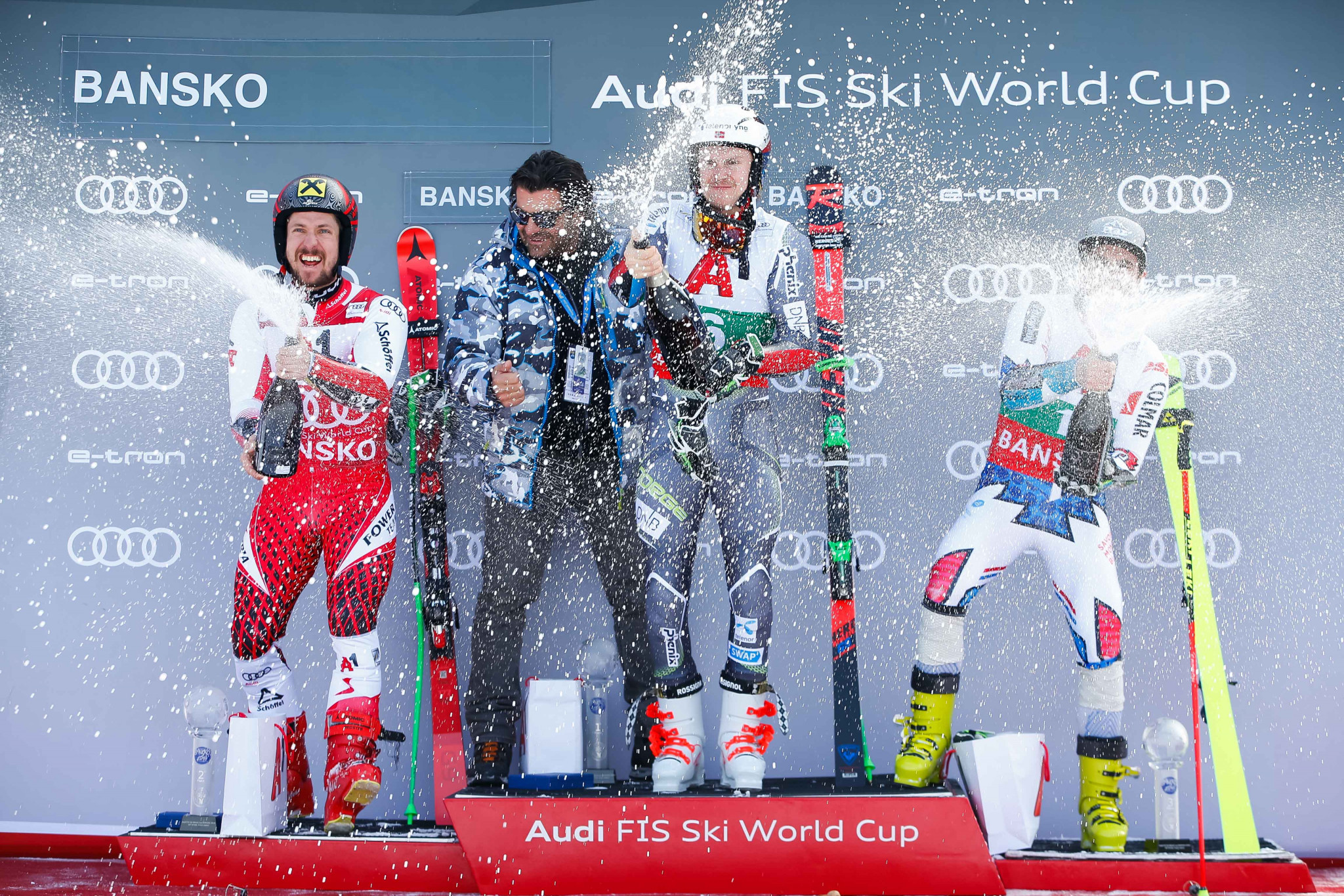 Henrik Kristoffersen, centre, gained his first World Cup win of the season in Bansko ©Getty Images