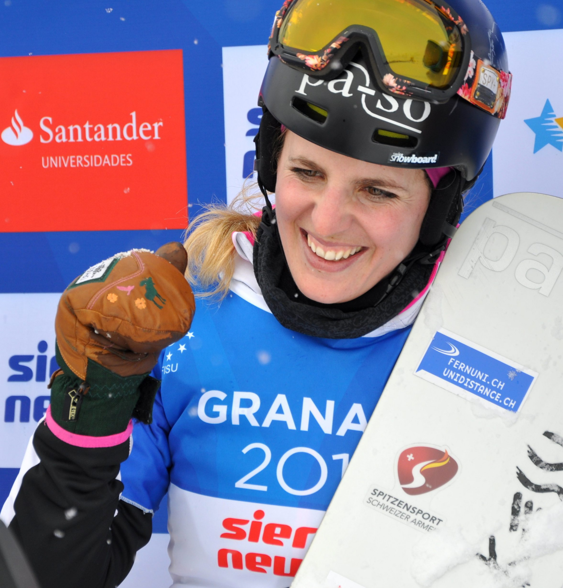 Switzerland's Patrizia Kummer celebrates her Winter Universiade gold medal in the parallel giant slalom at Granada 2015 - a year after she had won the Olympic gold medal in Sochi ©Patrizia Kummer
