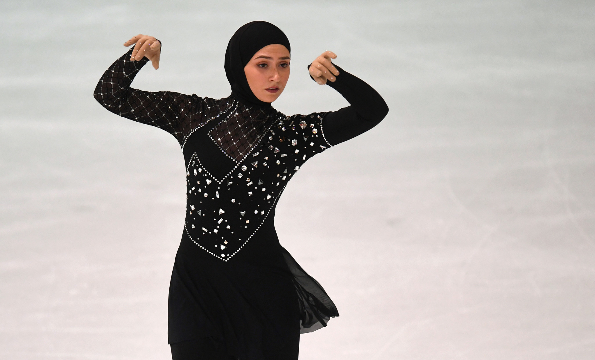 Zahra Lari became the first figure skater to compete in a headscarf in 2012 and was deducted a point for doing so ©Getty Images
