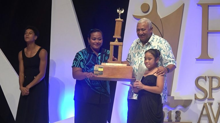 Sally Yee's Sportswoman of the Year title was received by her father, Henry ©Fiji Sports Awards