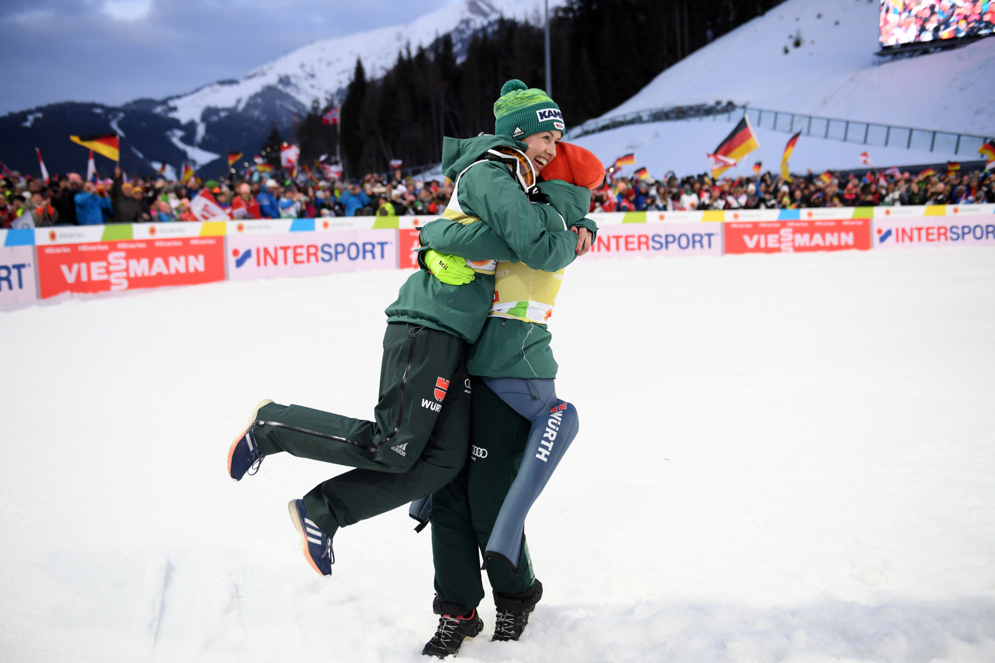 Germany celebrated victory in the mixed team ski jumping event ©Getty Images