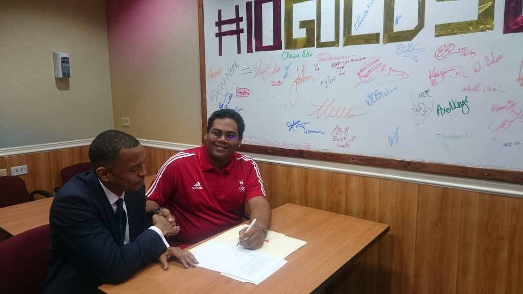 TTOC President Brian Lewis (left) signed the agreement with The Fan Club director Mikhail Singh (right) ©TTOC
