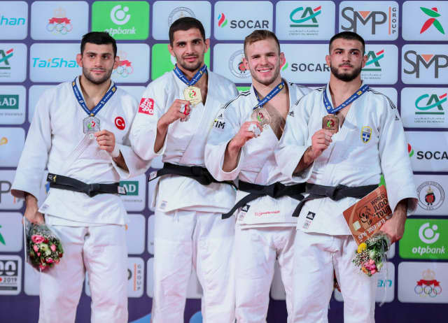 Bulgaria's Ivaylo Ivanov, second left, won gold in the men's under-81kg category on the second day of action at the IJF Marrakech Grand Prix ©IJF