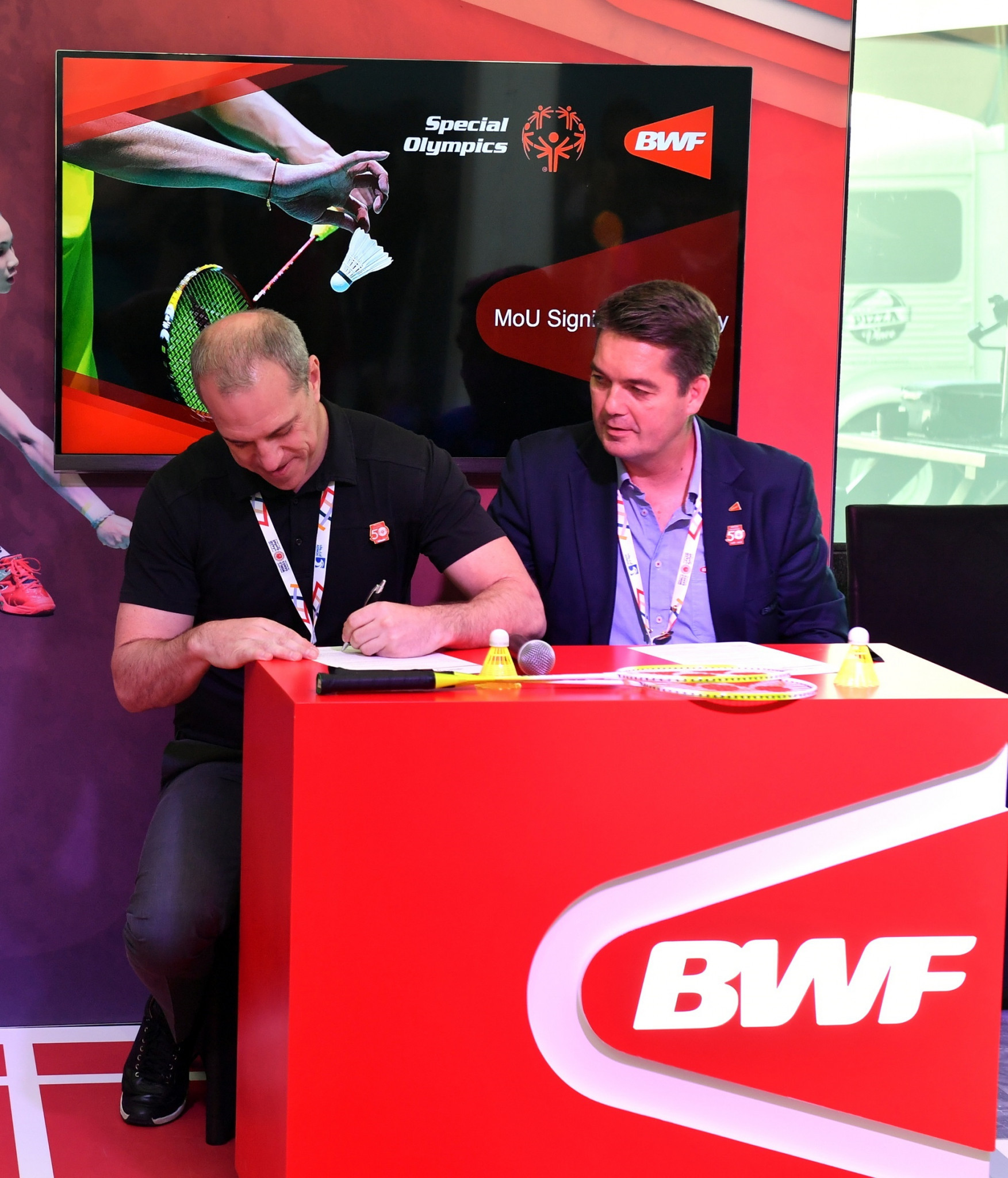 BWF President Poul-Erik Høyer, right, and Special Olympics senior vice-president of sport and health Drew Boshell undertook the signing ©BWF/James Varghese