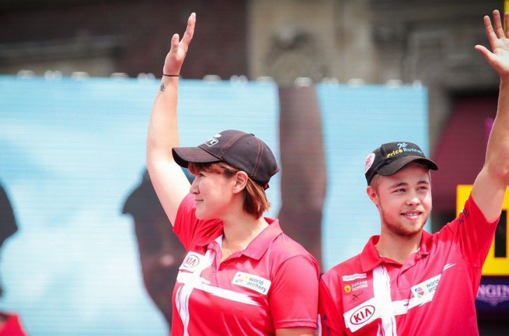 Danish duo Erika Anear and Stephan Hansen celebrate their compound mixed team triumph