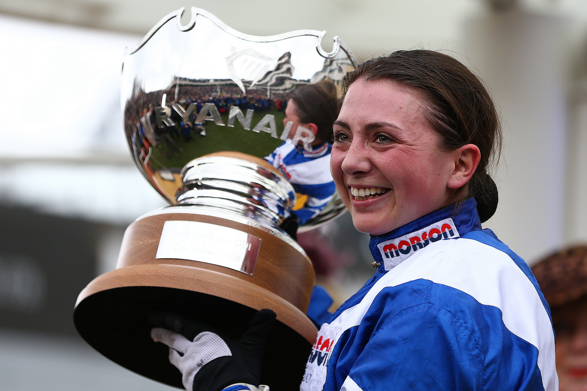 Jockey Bryony Frost poses with the trophy after she rides Frodon to victory during the Ryanair Chase ©Getty Images